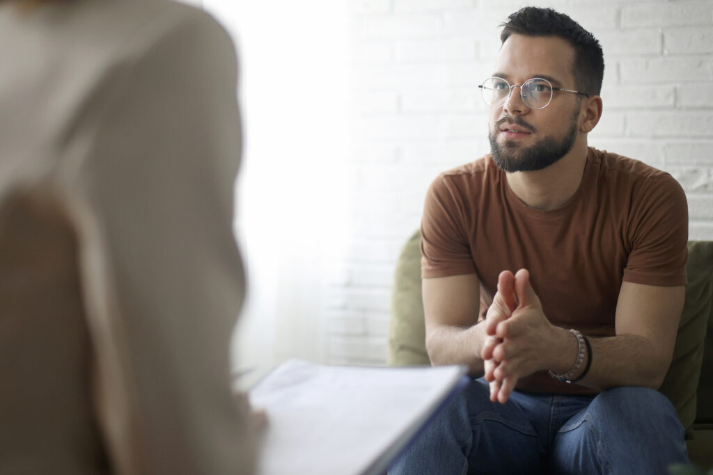Man talking to a therapist