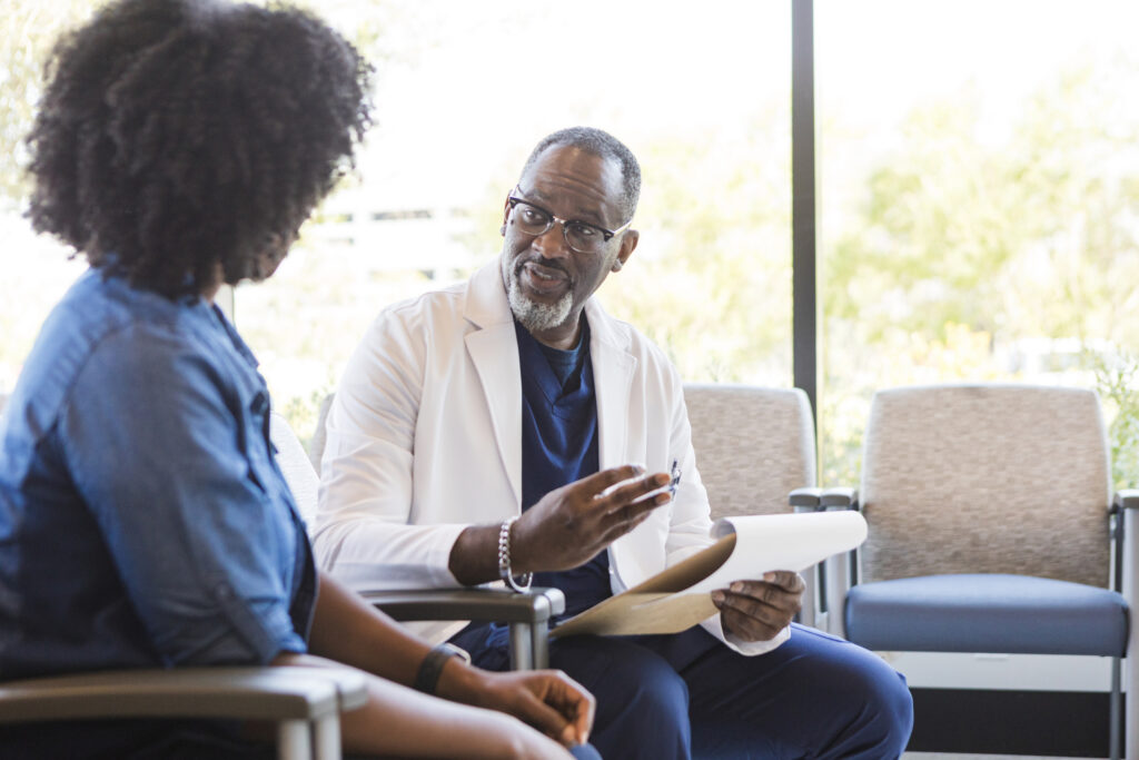 woman speaking with a doctor